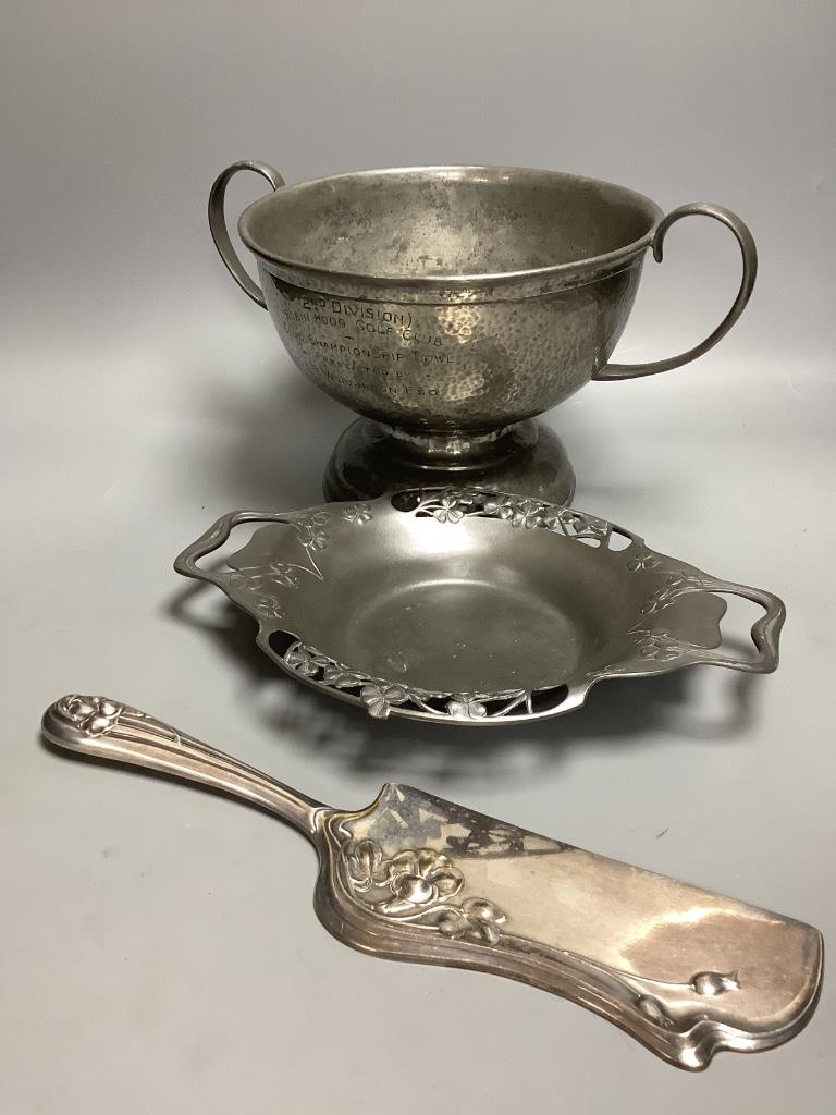 A Tudric planished pewter Golf Club Championship bowl, an unmarked Tudric dish and an Art Nouveau crumb scoop